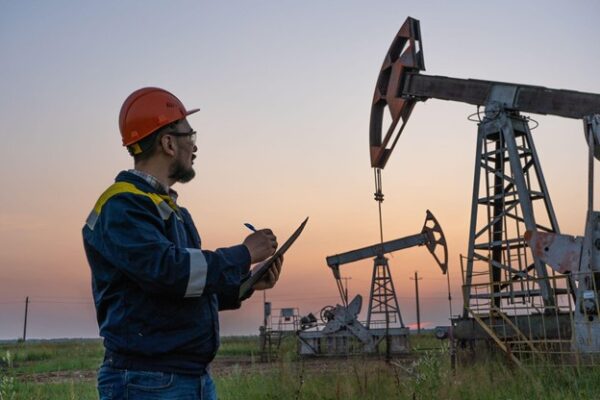 Oil as an Energy Source | Picture of a Contractor Taking Readings