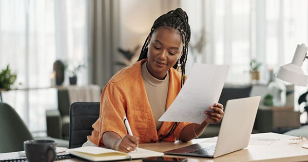 Reliability of AI-Generated Answers Woman Takes Notes